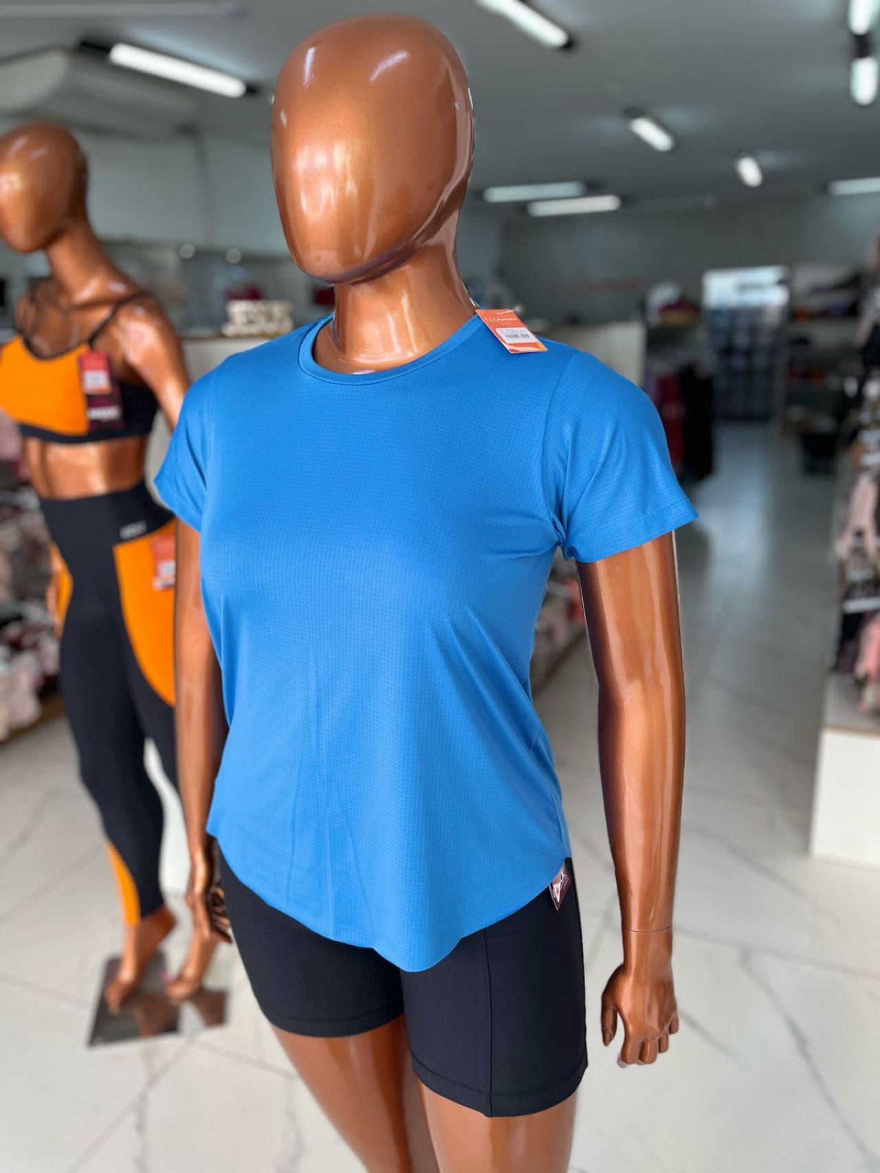 Liz Fit. Camiseta Feminina Tapa Bumbum Dry Fit manga curta