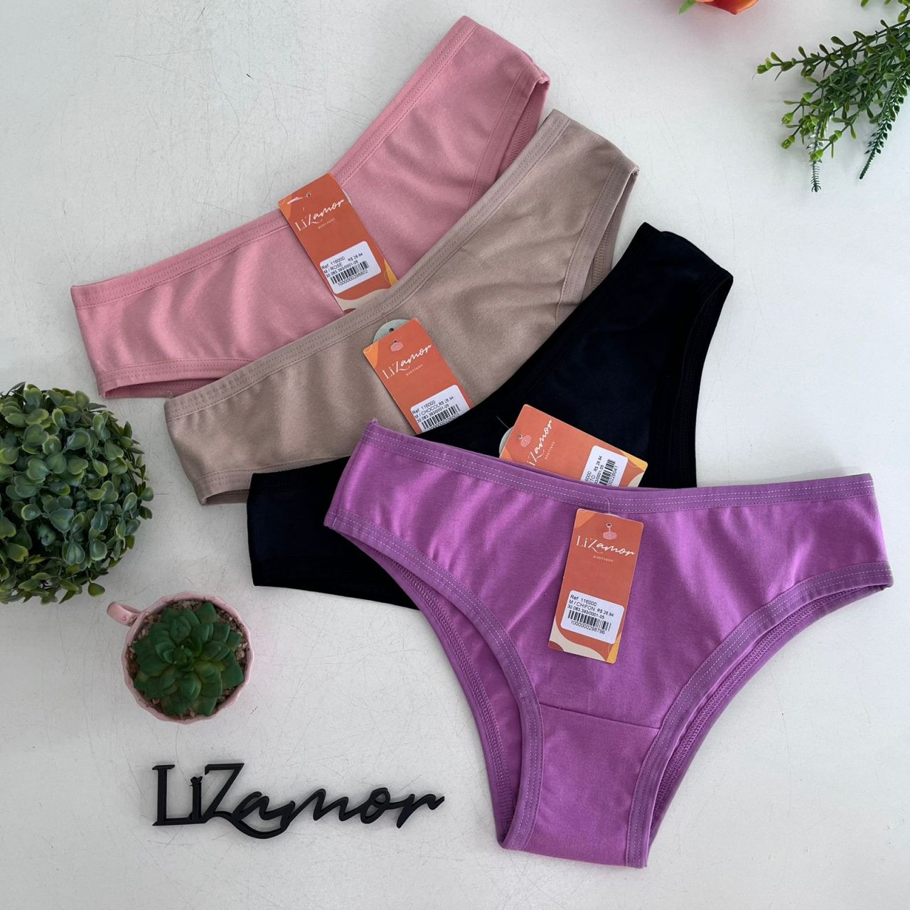 Tanga de coton lisa com viés reforçado.