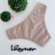 Tanga de coton lisa com viés reforçado.